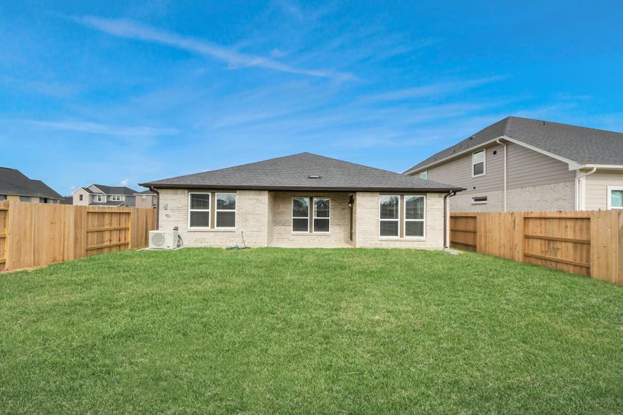 Exterior details and patio area of a home in Laurel Landing: Landmark Collection, Alvin (Image 25).
