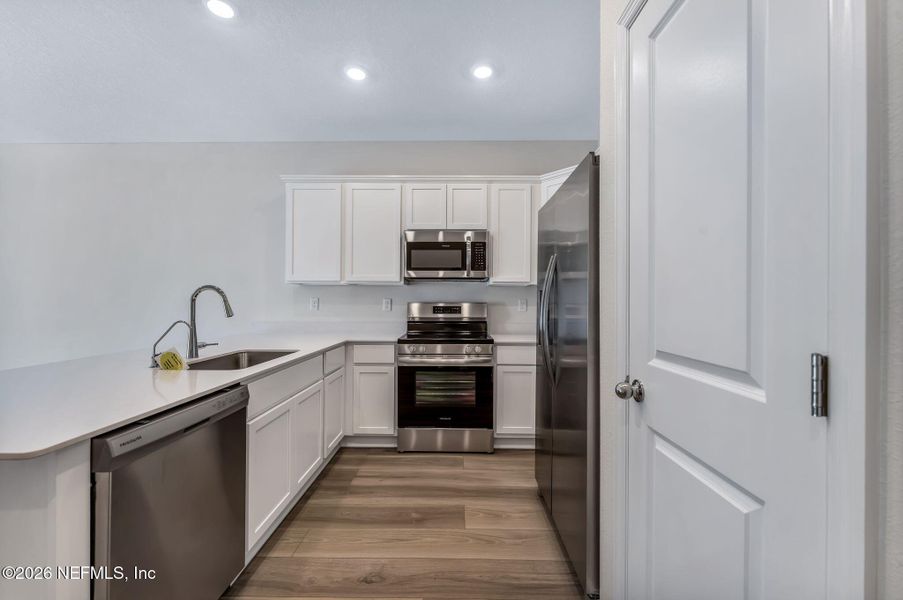 Furnished interior view inside a new home in , Orange Park (Image 10).
