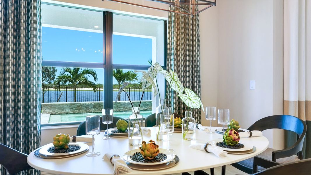 Representative furnished interior of a home built from the Meadow Brook by Neal Communities in SkySail, Naples (Image 11).