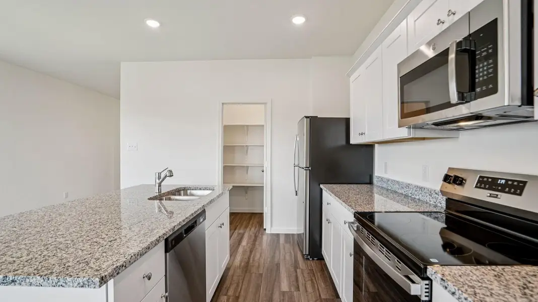 Furnished interior view inside a new home in The Landing, New Caney (Image 6).