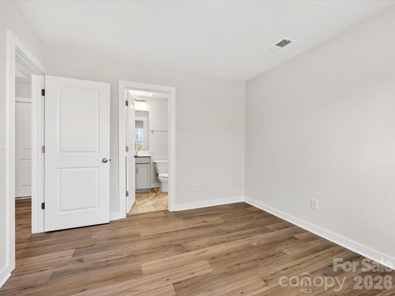 Spacious, unfurnished interior of a new home in Central Living at Craig, Charlotte (Image 26).
