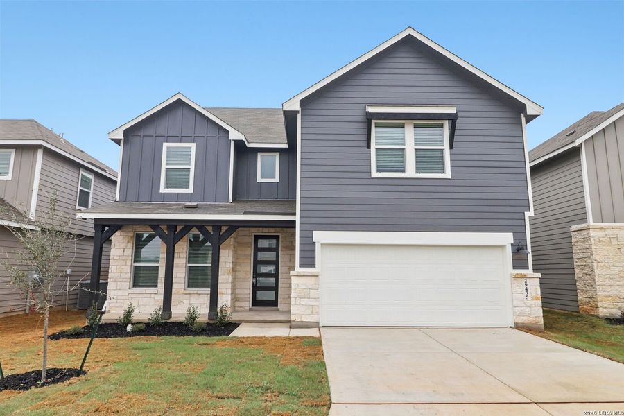 Front exterior of a new home in Estancia Ranch - Classic Series, San Antonio, TX, highlighting curb appeal (Image 27).