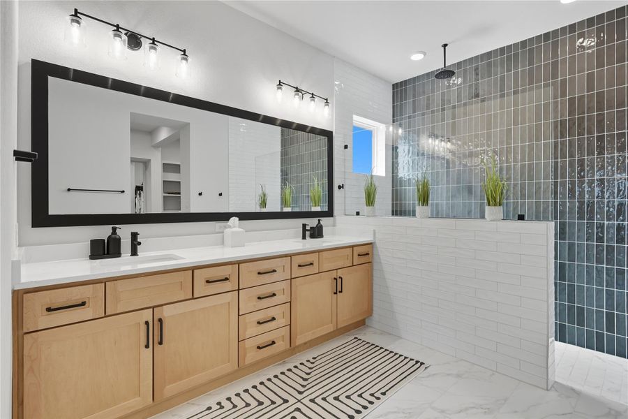 Double sinks and huge shower in the primary bathroom. Double sinks and huge shower in the primary bathroom.