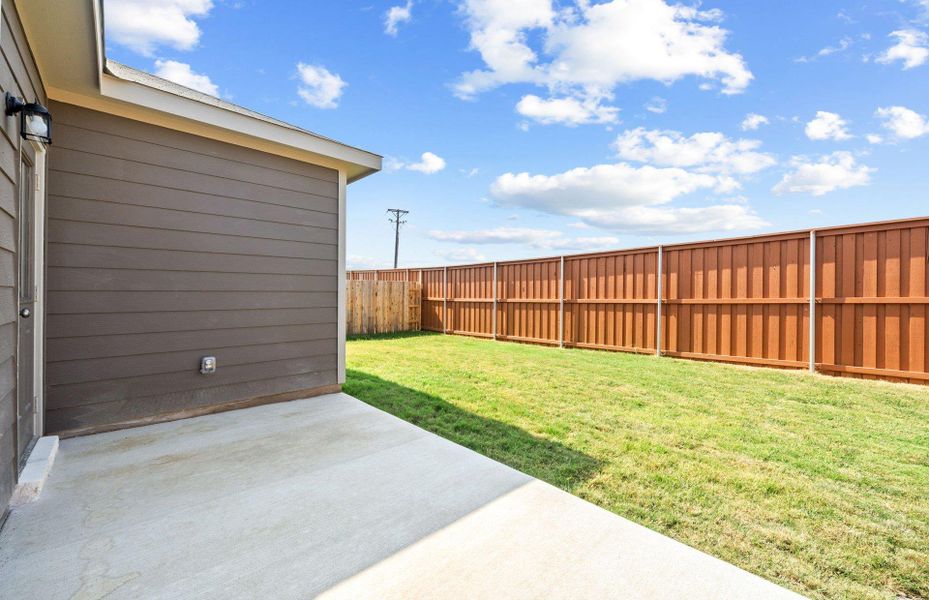 Exterior details and patio area of a home in Sunfield, Buda (Image 15). Exterior details and patio area of a home in Sunfield, Buda (Image 15).