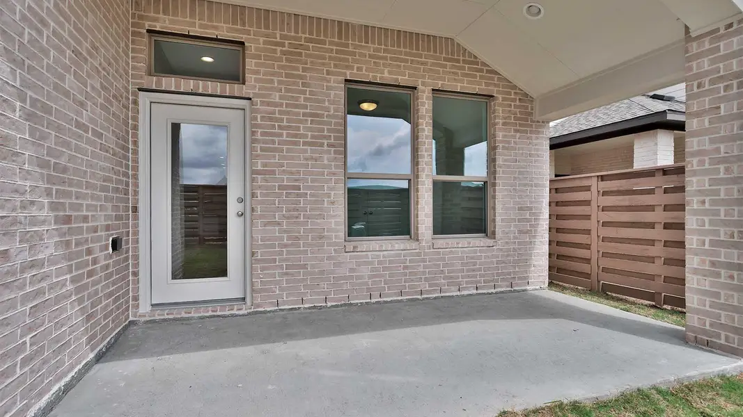 Exterior details and patio area of a home in Austin Point, Richmond (Image 3).
