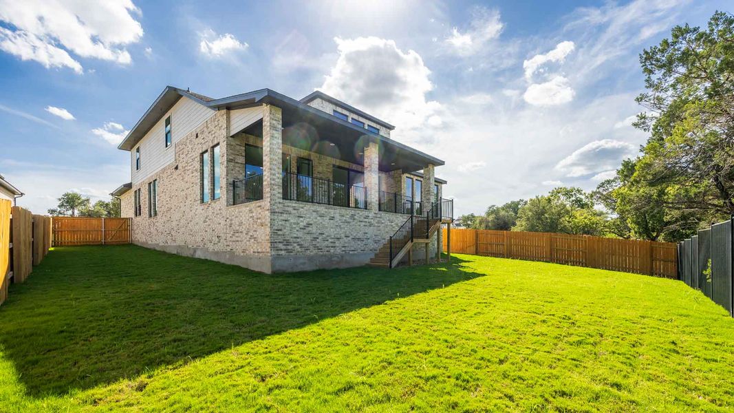 Exterior details and patio area of a home in Parkside on the River, Georgetown (Image 2).
