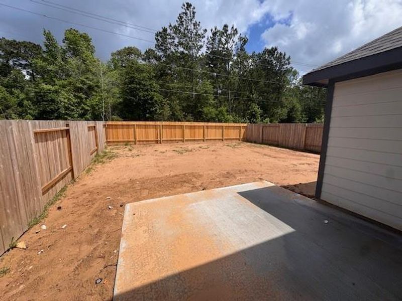 Exterior details and patio area of a home in Townsend Reserve, Splendora (Image 3).