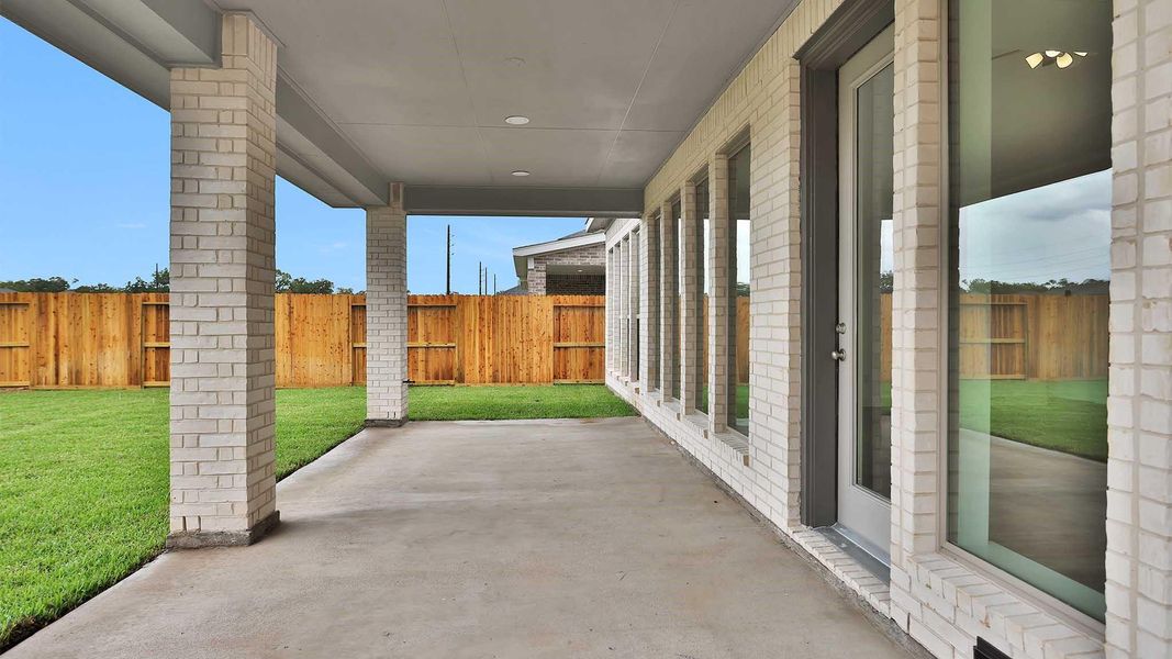 Exterior details and patio area of a home in Sienna 50', Missouri City (Image 2). Exterior details and patio area of a home in Sienna 50', Missouri City (Image 2).