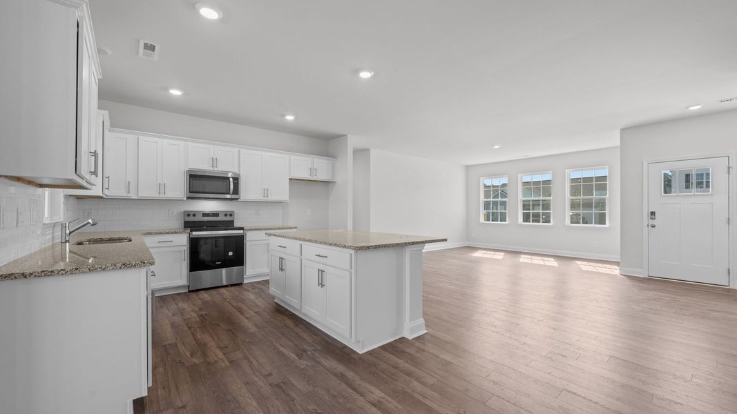 Furnished interior view inside a new home in Tyler - Home on the Lake, New Bern (Image 6). Furnished interior view inside a new home in Tyler - Home on the Lake, New Bern (Image 6).