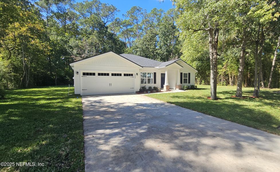 Front exterior of a new home in , Jacksonville, FL, highlighting curb appeal (Image 25).