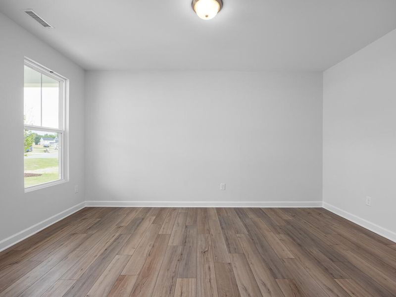 Spacious, unfurnished interior of a new home in Woodland Crossing, Zebulon (Image 13).