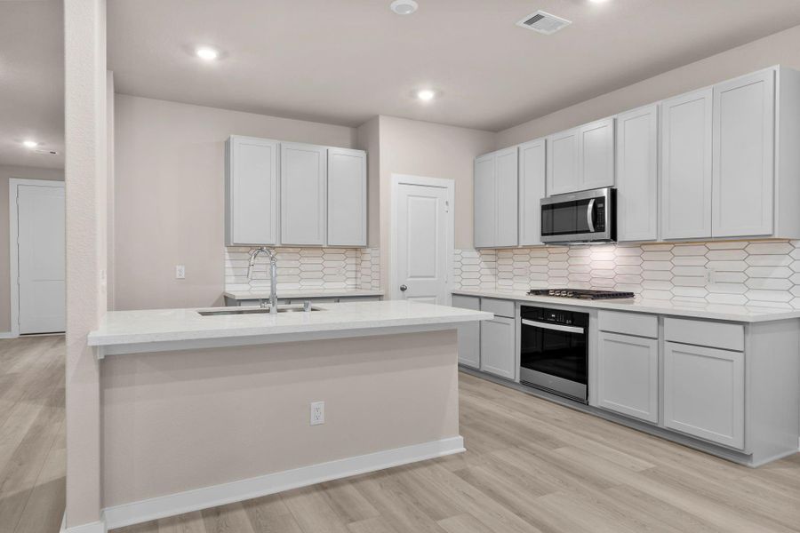 Furnished interior view inside a new home in Westridge Cove, Conroe (Image 6).