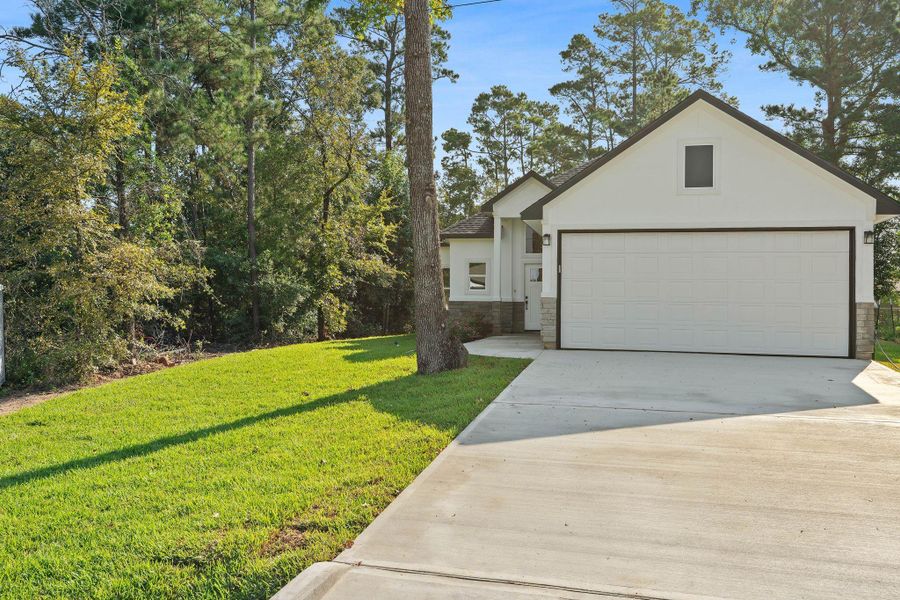 Exterior details and patio area of a home in , Willis (Image 19). Exterior details and patio area of a home in , Willis (Image 19).