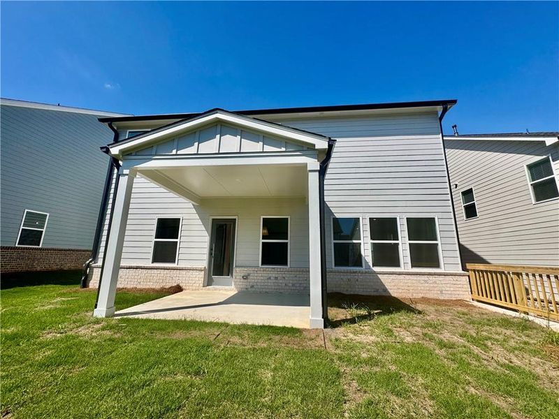 Exterior details and patio area of a home in Eastlyn Crossing, Flowery Branch (Image 4).