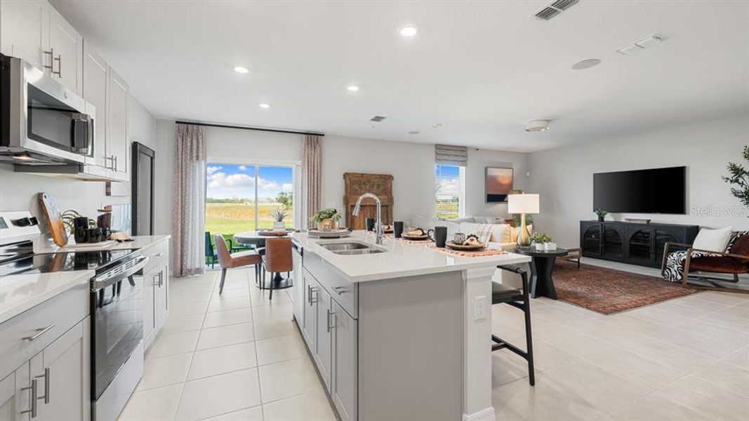 Furnished interior view inside a new home in Coasterra Community Group Page, Palmetto (Image 27).