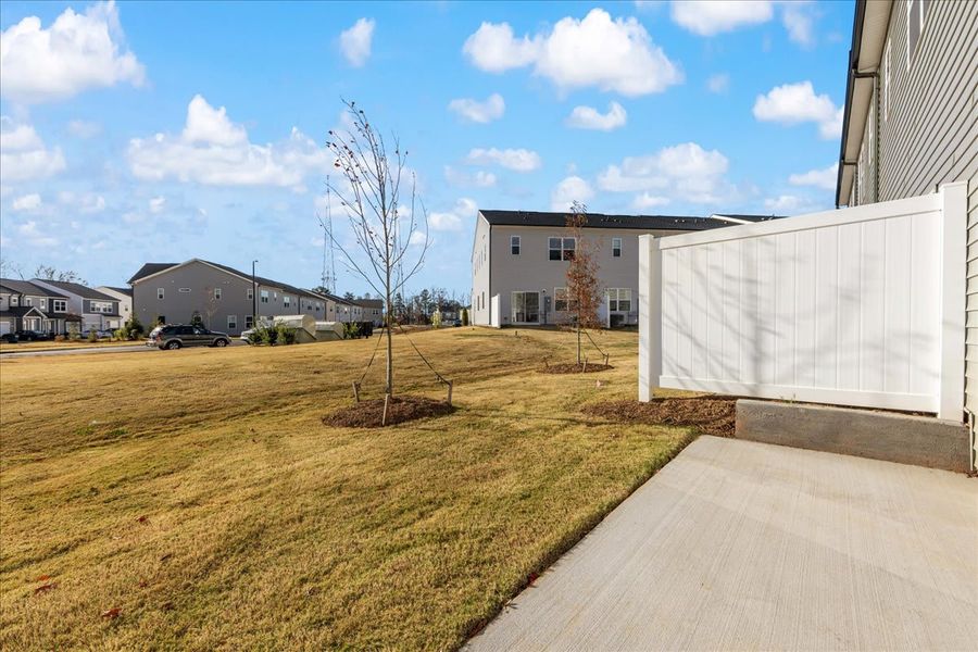 Exterior details and patio area of a home in Fifteen 15 Cannon, Charlotte (Image 21).