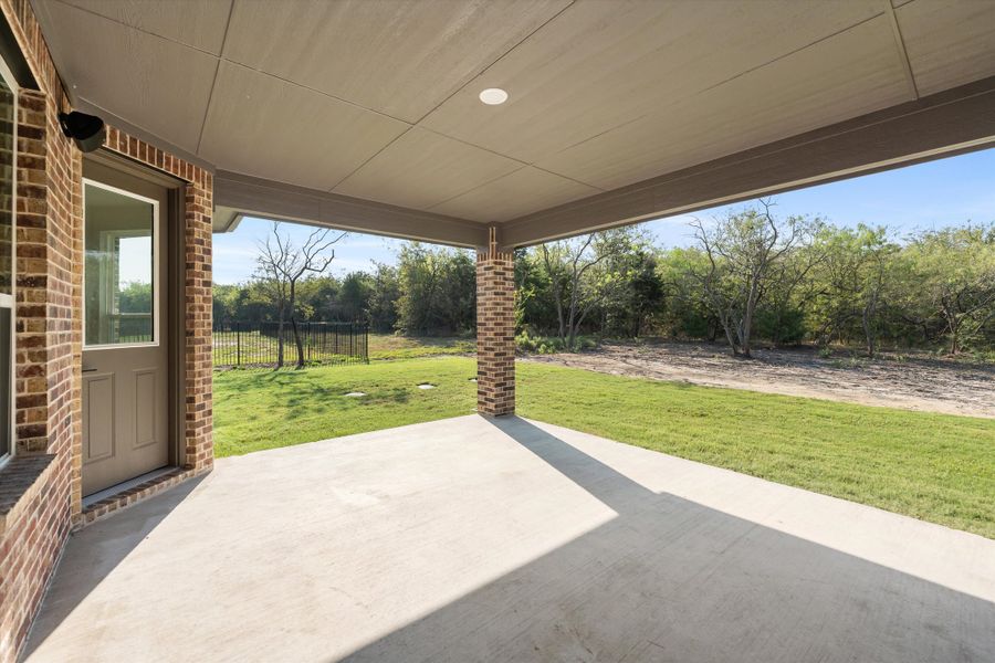Exterior details and patio area of a home in Vista Oaks Estates, Royse City (Image 19). Exterior details and patio area of a home in Vista Oaks Estates, Royse City (Image 19).
