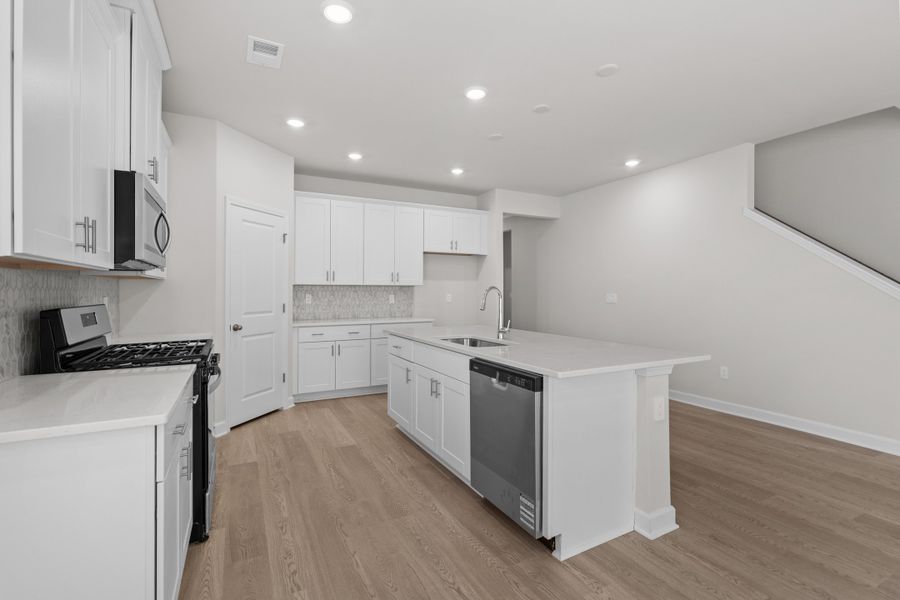 Furnished interior view inside a new home in Waterside - Coastline Series, Longs (Image 6).