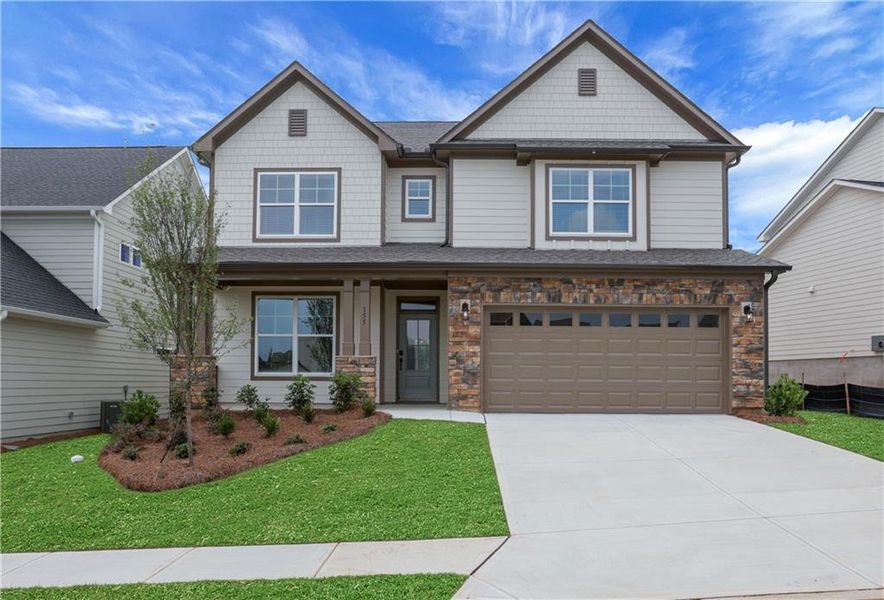 Front exterior of a new home in Twin Lakes, Hoschton, GA, highlighting curb appeal (Image 21).