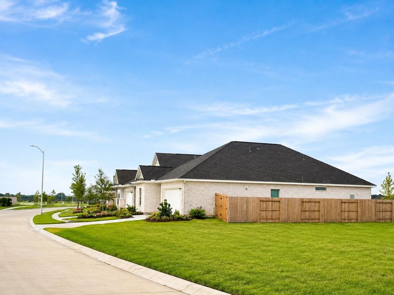 Front exterior of a new home in Cypress Green, Hockley, TX, highlighting curb appeal (Image 1). Front exterior of a new home in Cypress Green, Hockley, TX, highlighting curb appeal (Image 1).