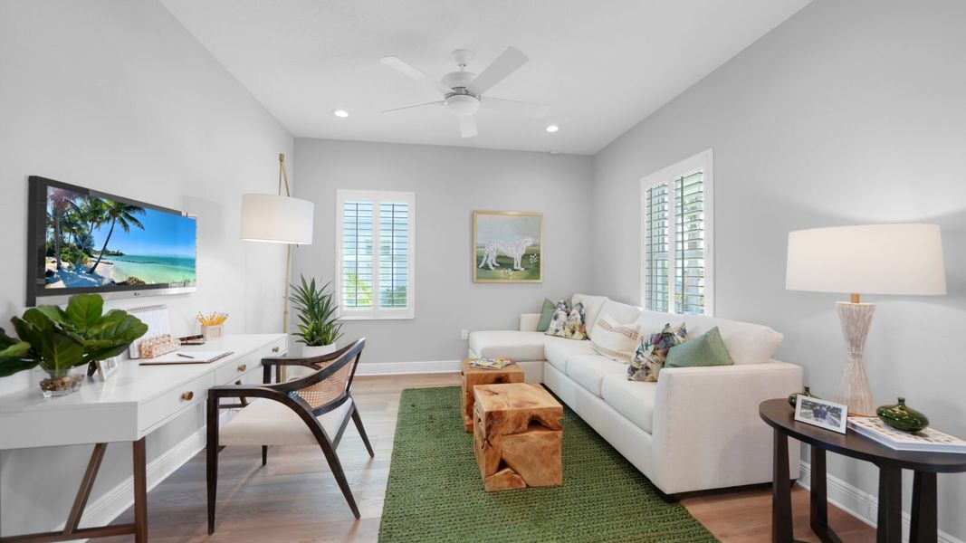 Representative furnished interior of a home built from the Meadow Brook by Neal Communities in Verandah, Fort Myers (Image 11).