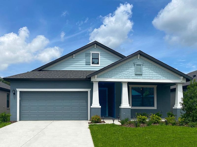 Representative exterior photo of a completed home built from the Sweetwater by William Ryan Homes in Myers Estates, Seffner, FL (Image 28).