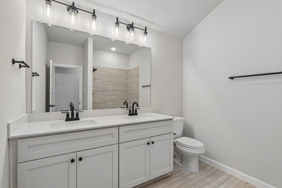 Furnished interior view inside a new home in Ribbonwood, Aubrey (Image 11).