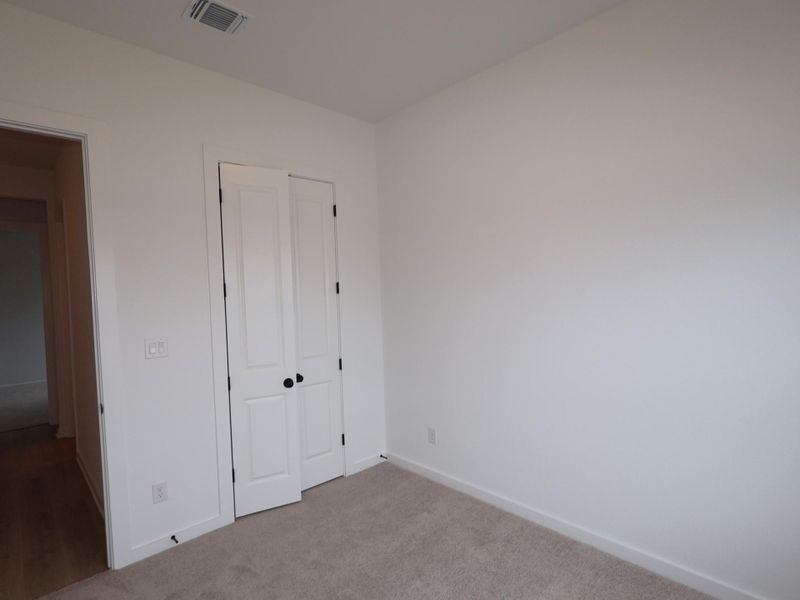 Spacious, unfurnished interior of a new home in Heritage, Dripping Springs (Image 7).