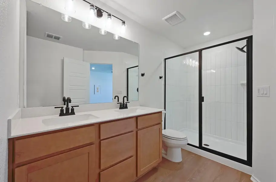 Furnished interior view inside a new home in Creekside at Estancia, Austin (Image 7). Furnished interior view inside a new home in Creekside at Estancia, Austin (Image 7).