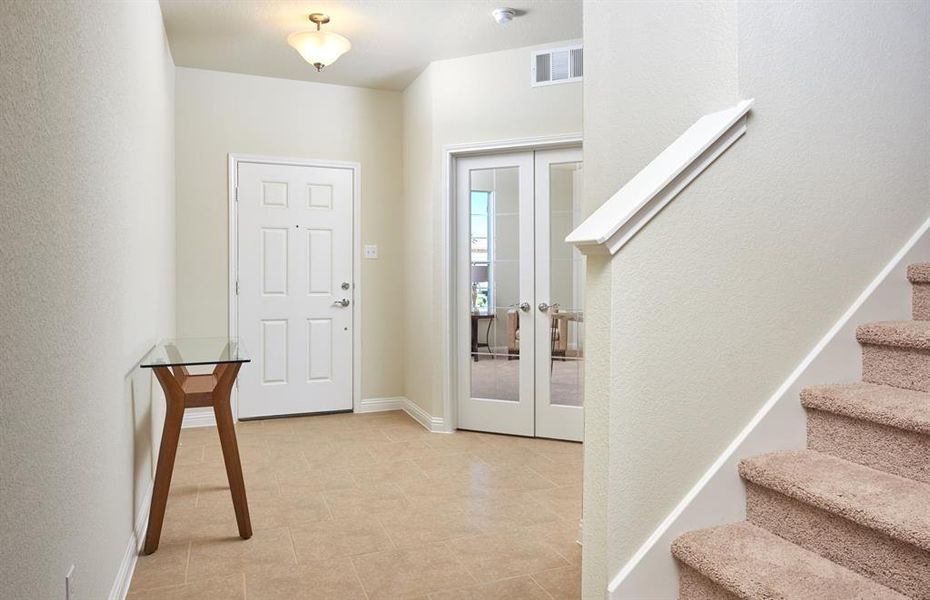 Welcoming entry way  *Photos of furnished model. Not actual home. Representative of floor plan. Some options and features may vary.