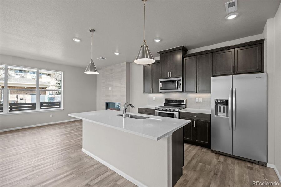 Furnished interior view inside a new home in Ralston Creek, Arvada (Image 7).