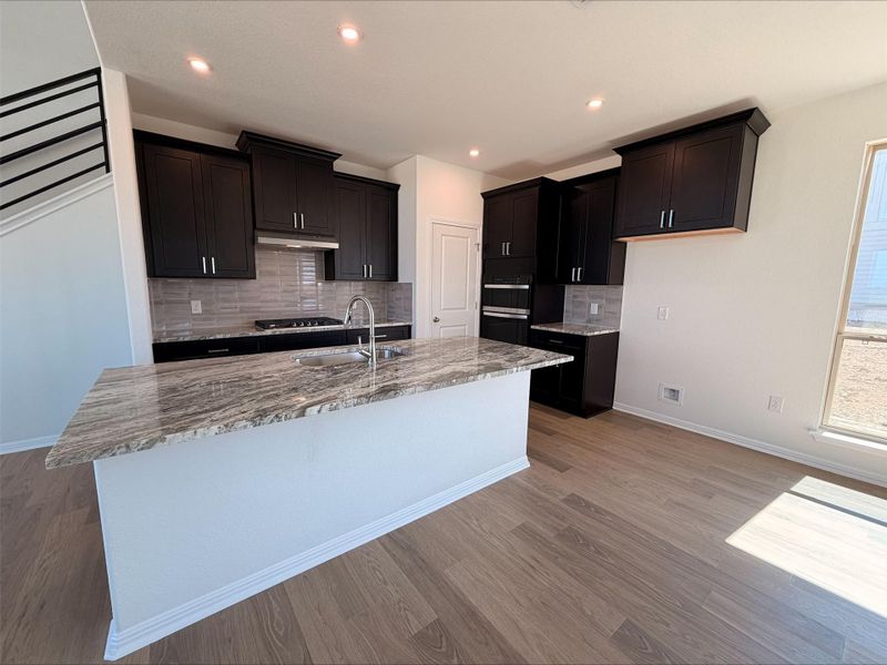 Furnished interior view inside a new home in Crosswinds, Kyle (Image 4).
