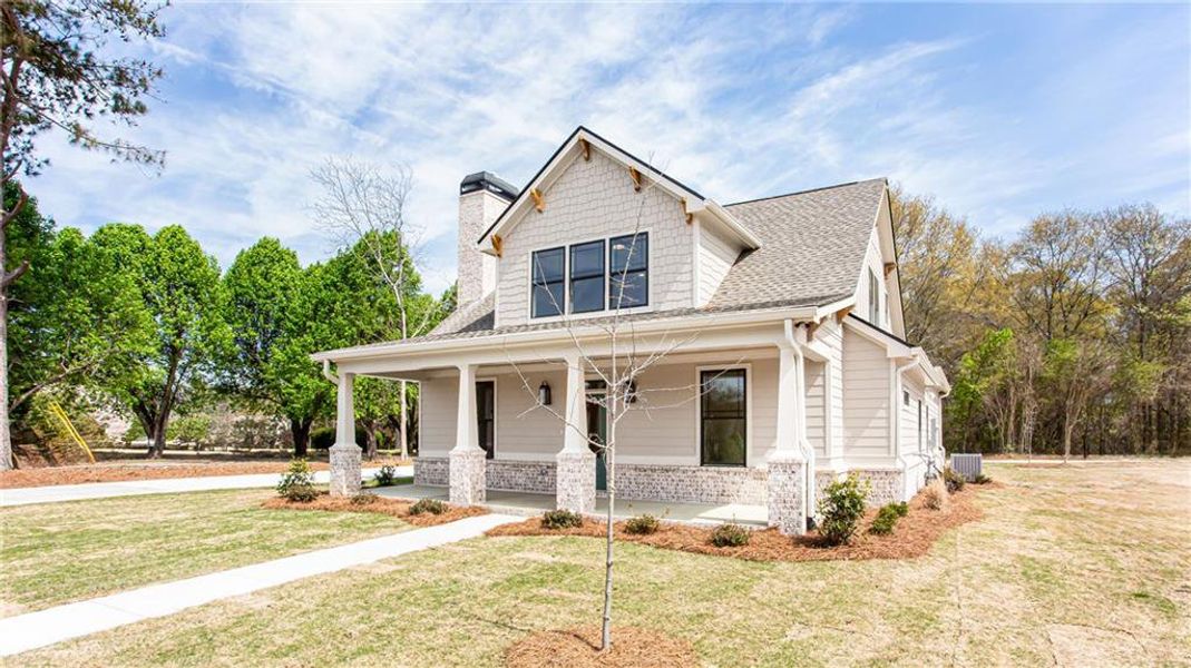 Front exterior of a new home in , Grayson, GA, highlighting curb appeal (Image 22).
