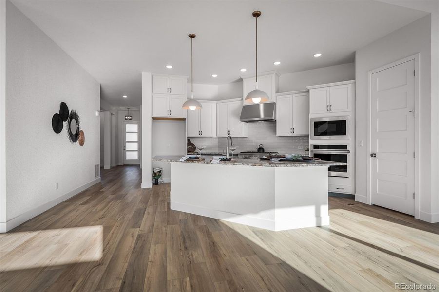 Furnished interior view inside a new home in Cloverleaf - Pinnacle Collection, Monument (Image 29).