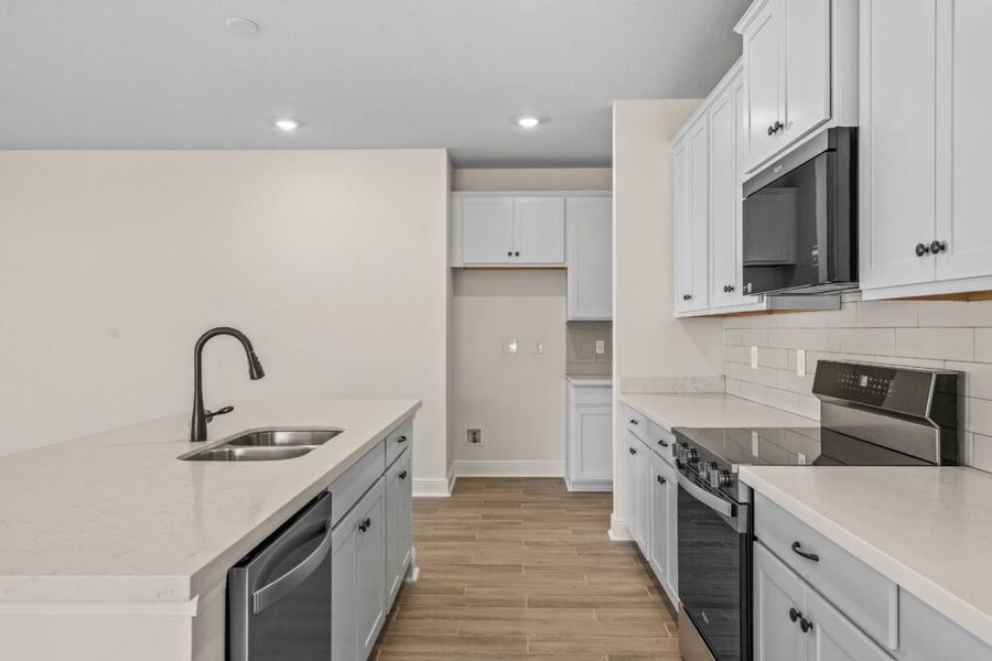 Furnished interior view inside a new home in Natureview, Freeport (Image 7).