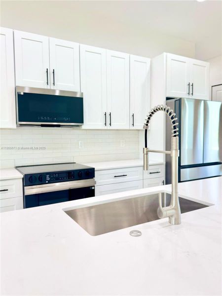 Furnished interior view inside a new home in , Rotonda West (Image 13).