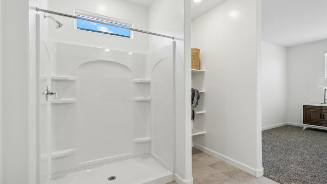 Representative furnished interior of a home built from the Justin by D.R. Horton in Sorrento, Maricopa (Image 20).