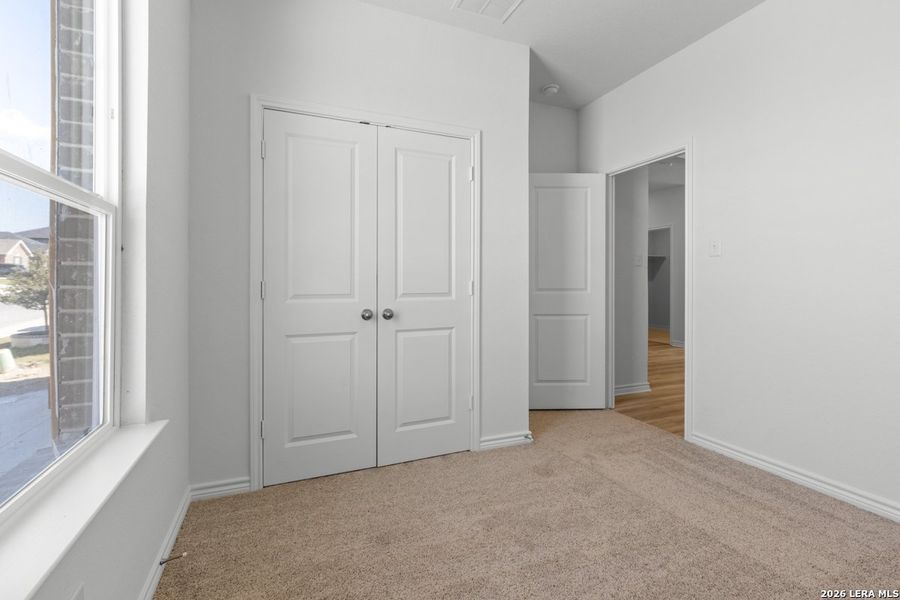 Spacious, unfurnished interior of a new home in Hidden Bluffs at TRP, San Antonio (Image 28).