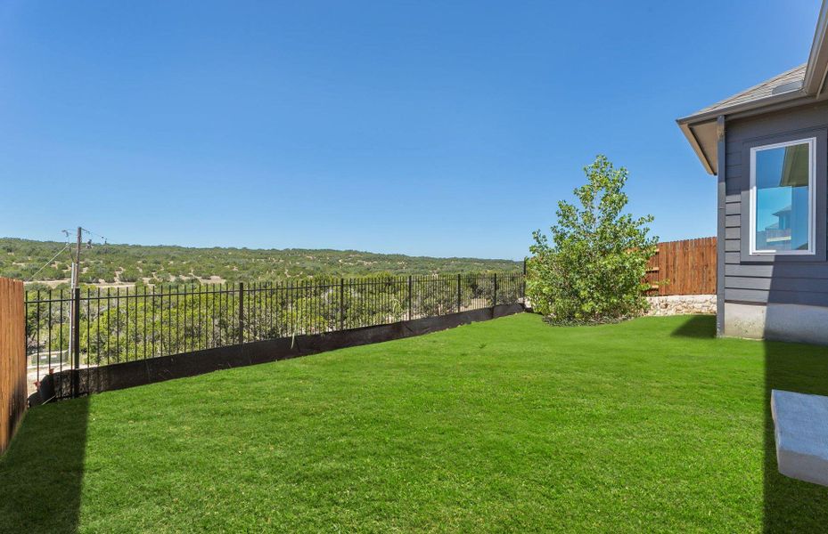 Exterior details and patio area of a home in West Cypress Hills, Spicewood (Image 19).