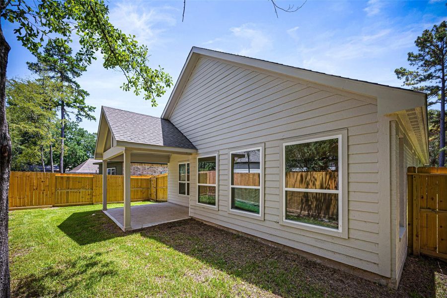 Front exterior of a new home in , Montgomery, TX, highlighting curb appeal (Image 17). Front exterior of a new home in , Montgomery, TX, highlighting curb appeal (Image 17).