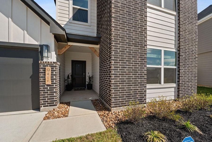 Recessed front door for additional privacy into the entry and space to decorate the front porch for holidays!