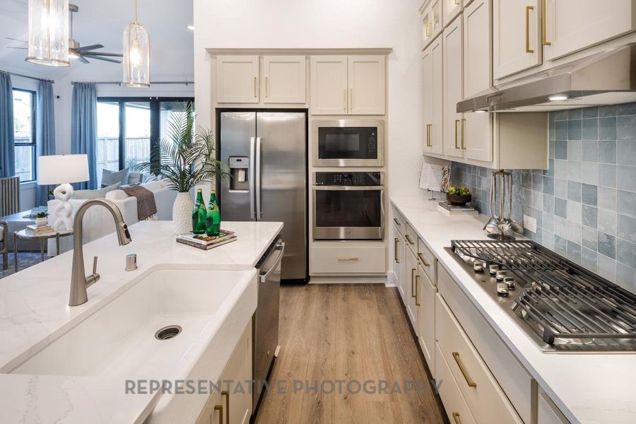 Furnished interior view inside a new home in 6 Creeks at Waterridge, Kyle (Image 9).