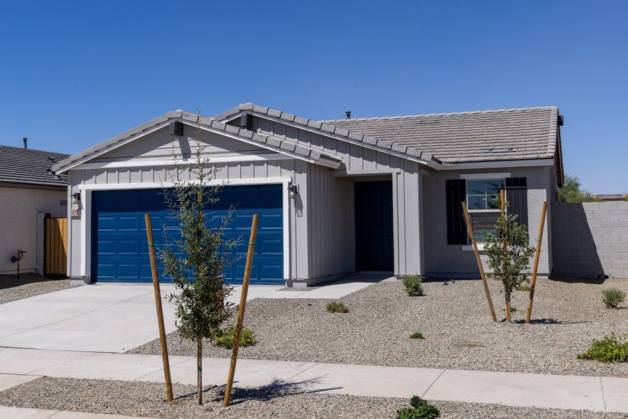 Front exterior of a new home in Rancho Santa Rosa, Maricopa, AZ, highlighting curb appeal (Image 2).