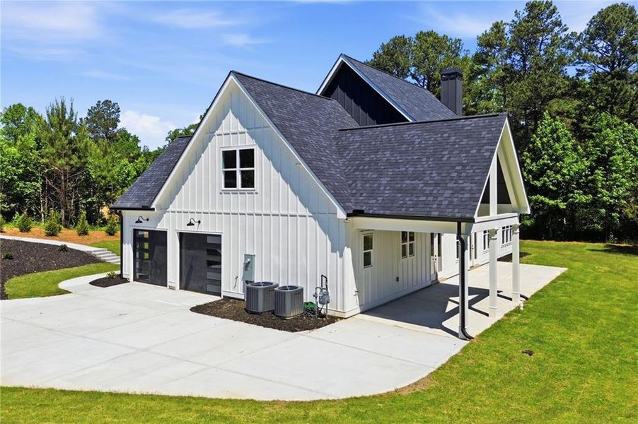 Front exterior of a new home in , Cumming, GA, highlighting curb appeal (Image 34).