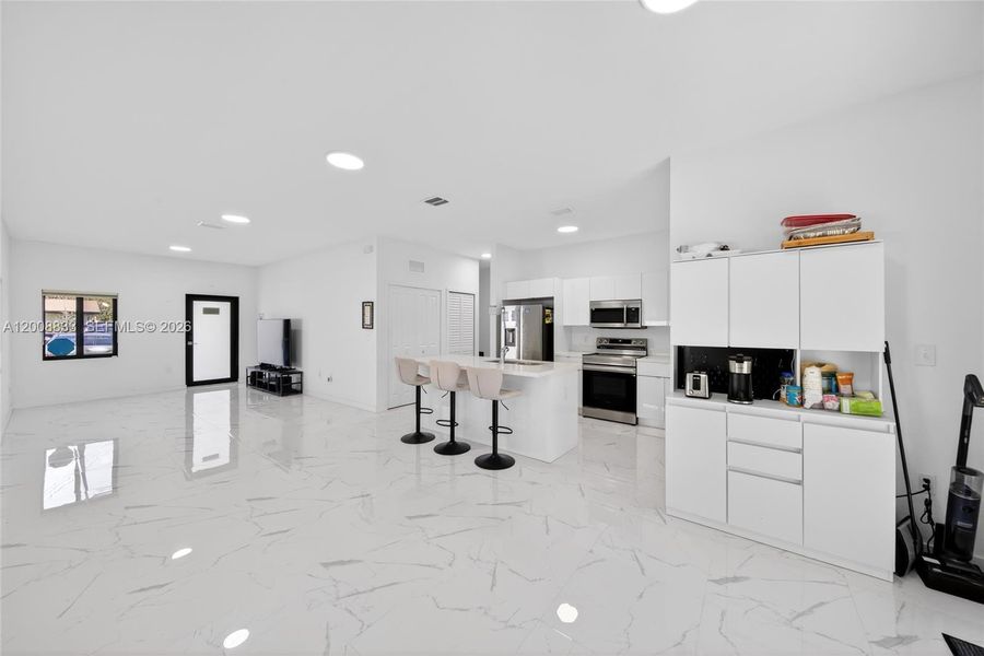 Furnished interior view inside a new home in , Miami (Image 12).