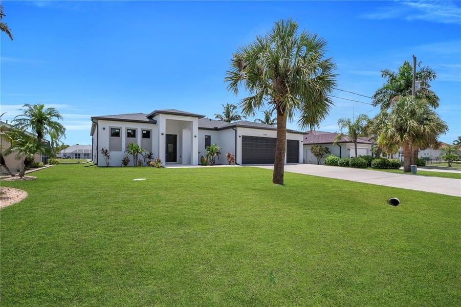 Front exterior of a new home in , Port Charlotte, FL, highlighting curb appeal (Image 23). Front exterior of a new home in , Port Charlotte, FL, highlighting curb appeal (Image 23).