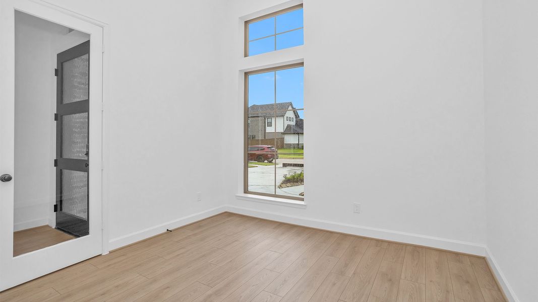 Spacious, unfurnished interior of a new home in Legacy Prairie at Katy Court, Katy (Image 9).