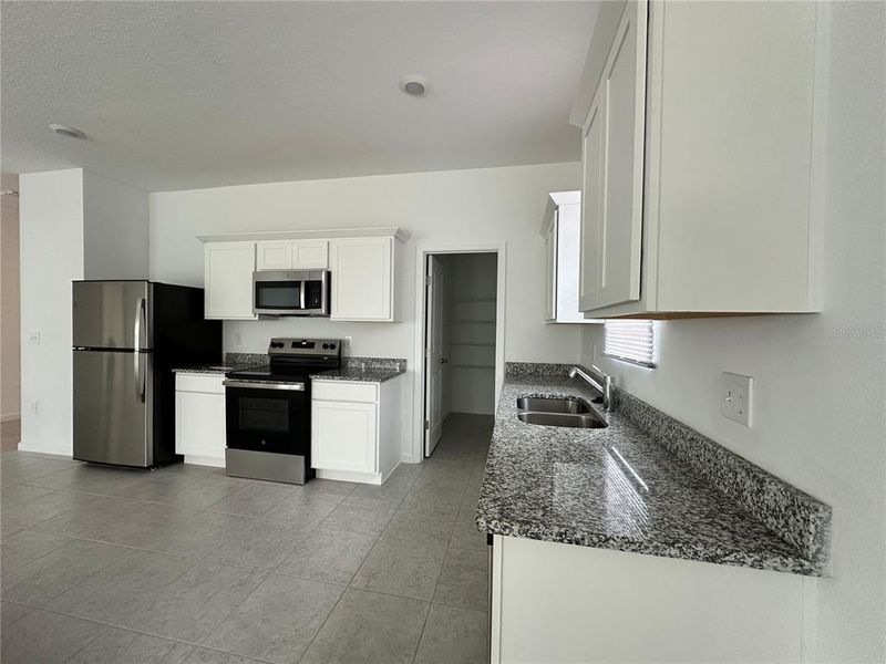 Furnished interior view inside a new home in , Lake Wales (Image 3). Furnished interior view inside a new home in , Lake Wales (Image 3).
