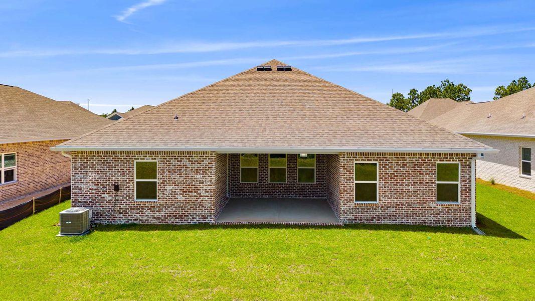 Exterior details and patio area of a home in Owl's Head Farms, Freeport (Image 3).