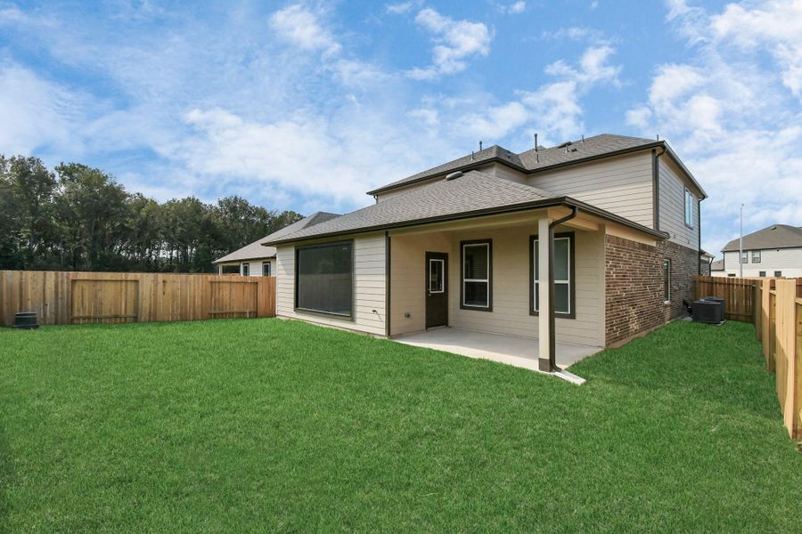 Backyard retreat, offering an abundance of space for kids to play and explore. The possibilities are endless in this outdoor haven, where the joy of open-air activities and family gatherings awaits.